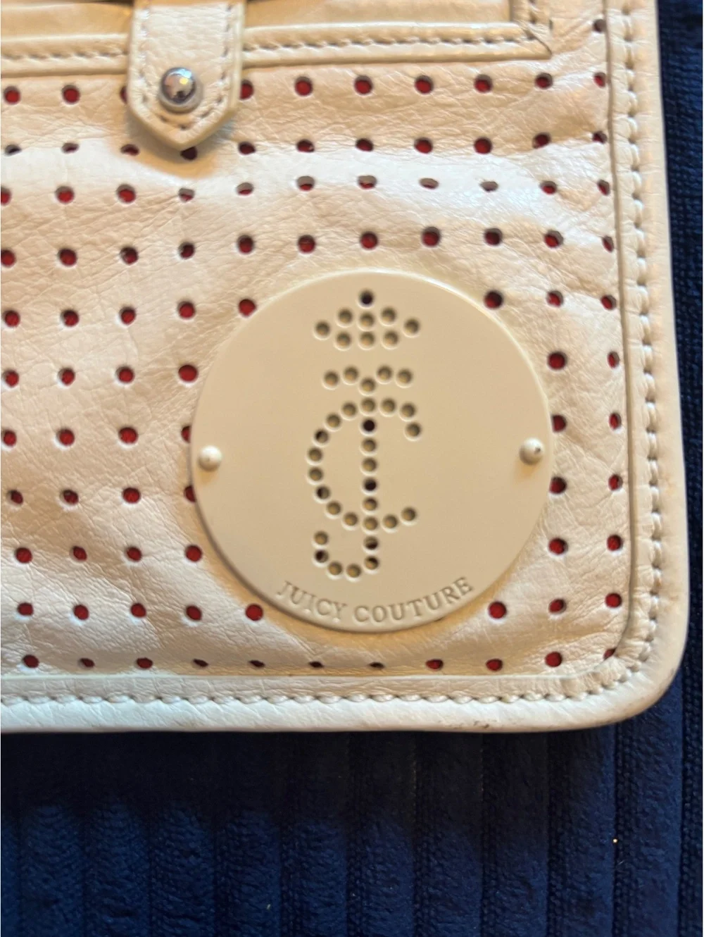 Juicy Couture Cream Perforated Leather Wristlet Clutch